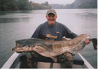 Kirk Farrell and his 98lb catfish